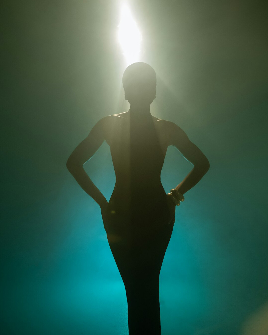 Fashion runway show with dramatic lighting
