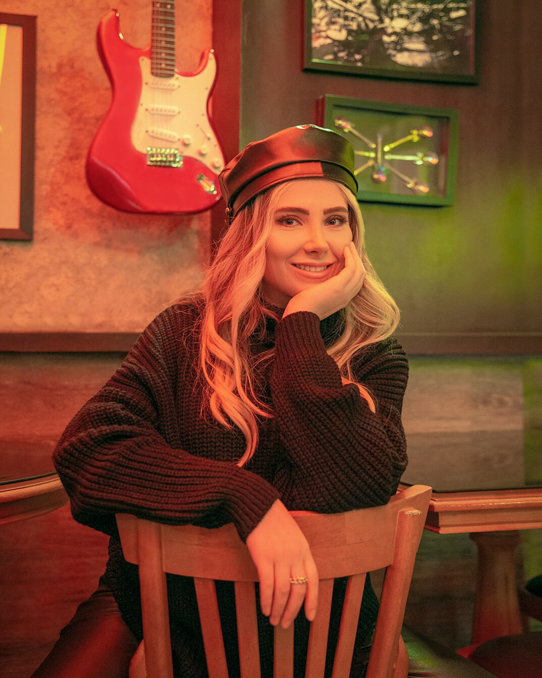 Uruguayan television host smiling in a television studio